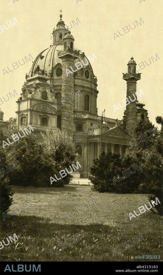 Karlskirche, Vienna, Austria, c1935. St Charles' Church, dedicated to Saint Charles Borromeo, was designed by Johann Bernhard Fischer von Erlach and his son Joseph Emanuel Fischer von Erlach, and completed in 1737. From "Österreich - Land Und Volk", (Austria, Land and People). [R. Lechner (Wilhelm Müller), Vienna, c1935].