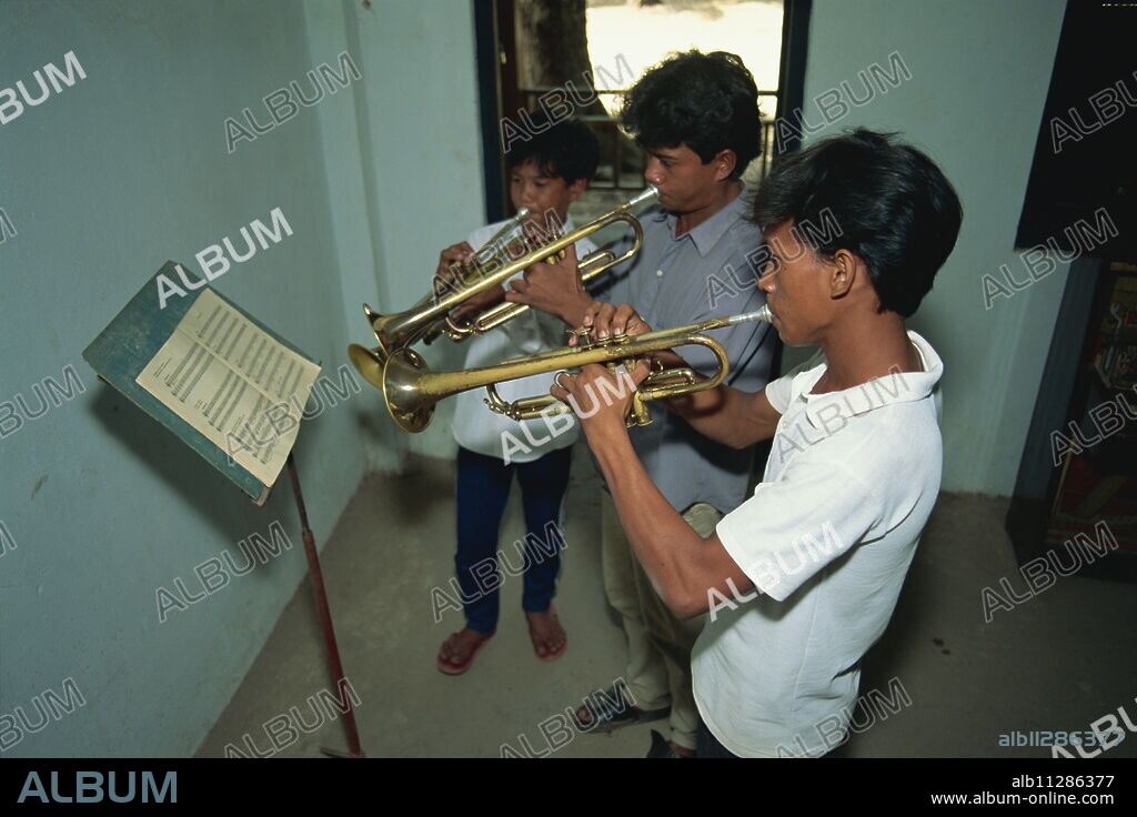 Learning classical music, Music school, Phnom Penh, Cambodia, Indochina, Southeast Asia, Asia.