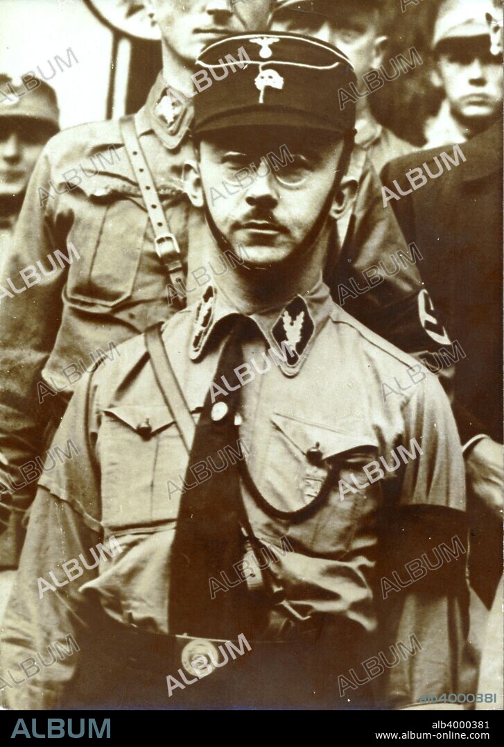 Heinrich Himmler, Reichsführer of the SS, c1930s-c1940s. Himmler (1900-1945) took part in Adolf Hitler's Beer Hall Putsch in Munich in 1923. He joined the SS in 1925, becoming its leader, or Reichsführer, in 1929. He went on to become one of the most powerful figures in the Nazi Party and was responsible for overseeing the organisation and administration of the Holocaust. In late April 1945 as the Second World War neared its end in Europe, Himmler went behind Hitler's back in an attempt to open negotiations with the Western Allies. When Hitler disovered this he stripped Himmler of all his offices and ordered his arrest. He tried to evade capture by disguising himself after the War ended, but was captured by the British on 22 May 1945. The following day, before he could be interrogated, Himmler committed suicide by biting a potassium cyanide capsule.