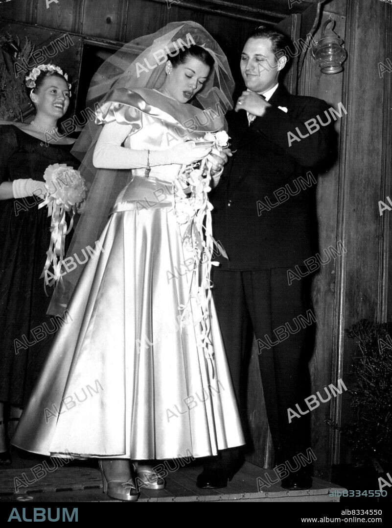Janis Paige-Frank Martinelli Married -- Film Actress Janis Paige and Frank Martinelli, Jr San Francisco Restauranteur, leave the little brown church of the valley following their marriage in North Hollywood, Calif., Dec. 27. They planned a short honeymoon, destination undisclosed. December 29, 1947.  (Photo by Associated Press Photo).