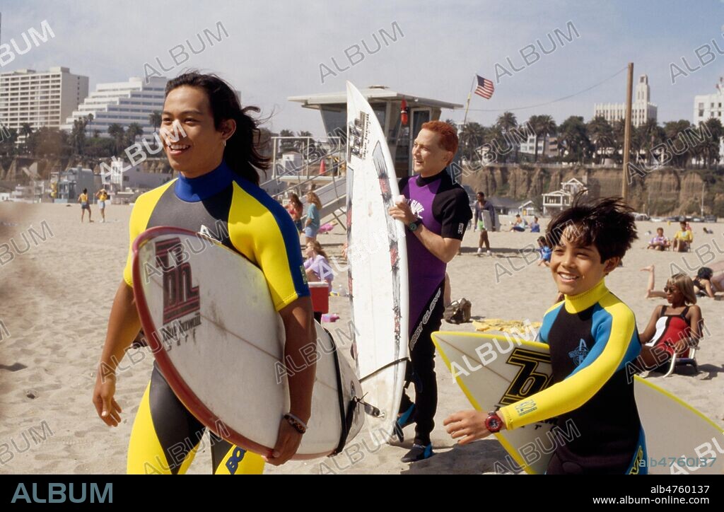 ERNIE REYES JR, NICOLAS COWAN and ROB SCHNEIDER in SURF NINJAS, 1993, directed by NEAL ISRAEL. Copyright NEW LINE CINEMA.