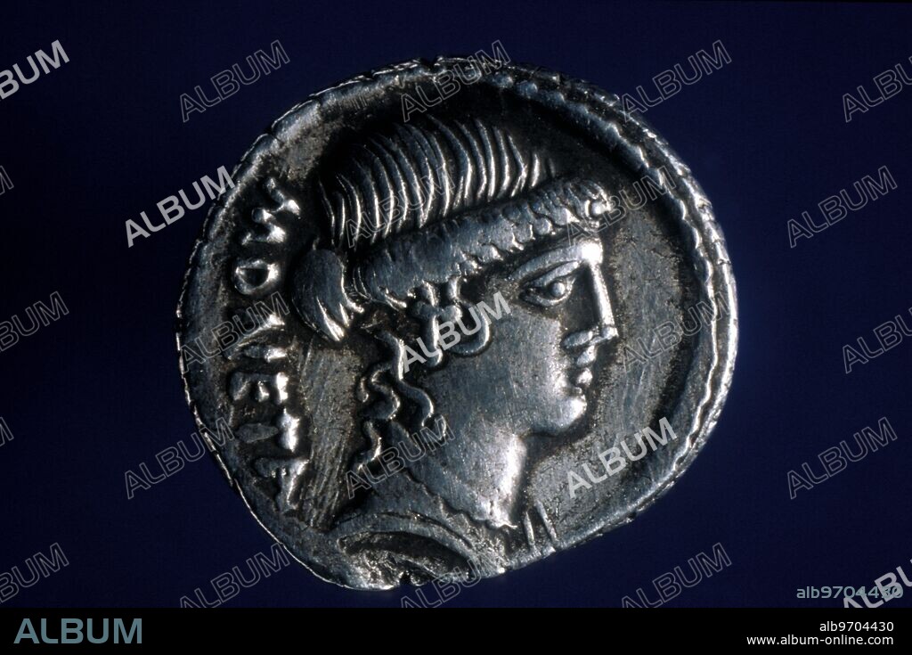 The HSBC Money Gallery. Head of the Goddess Juno Moneta, from whose the name 'money' is derived, shown on a silver coin of ancient Rome, issued c.45BC.