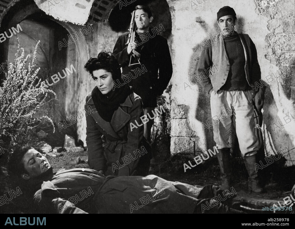 ANTHONY QUINN, GIA SCALA, GREGORY PECK and IRENE PAPAS in THE GUNS OF NAVARONE, 1961, directed by J. LEE THOMPSON. Copyright COLUMBIA PICTURES.
