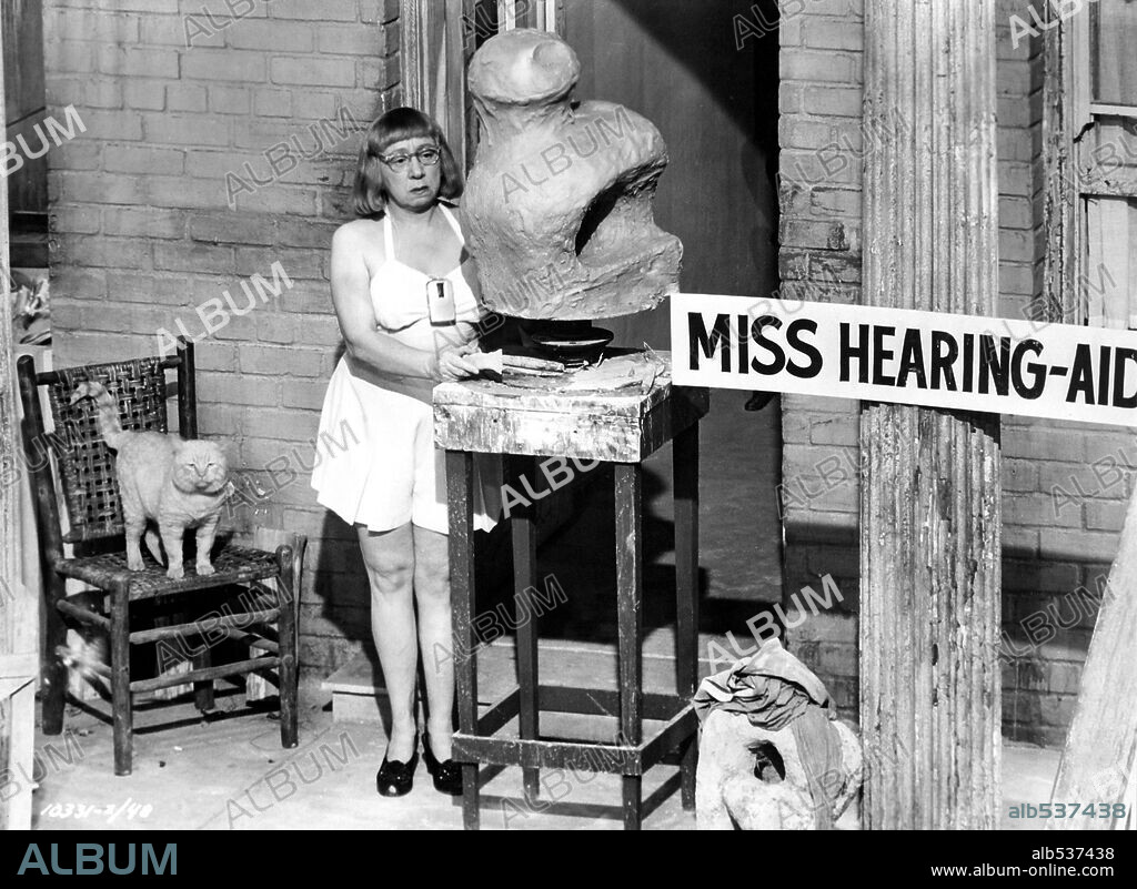 JESSLYN FAX in REAR WINDOW, 1954, directed by ALFRED HITCHCOCK. Copyright PARAMOUNT PICTURES.
