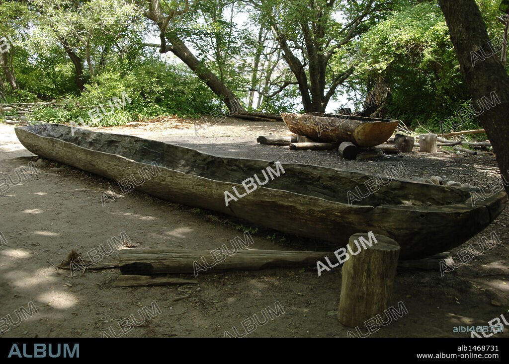Plimoth Plantation or Historical Museum. Is a living museum in that shows the original settlement of the Plymouth Colony established in the 17th century by English colonists. Canoe. Wampanoag Indian tribe. Plymouth. Massachusetts. United States.