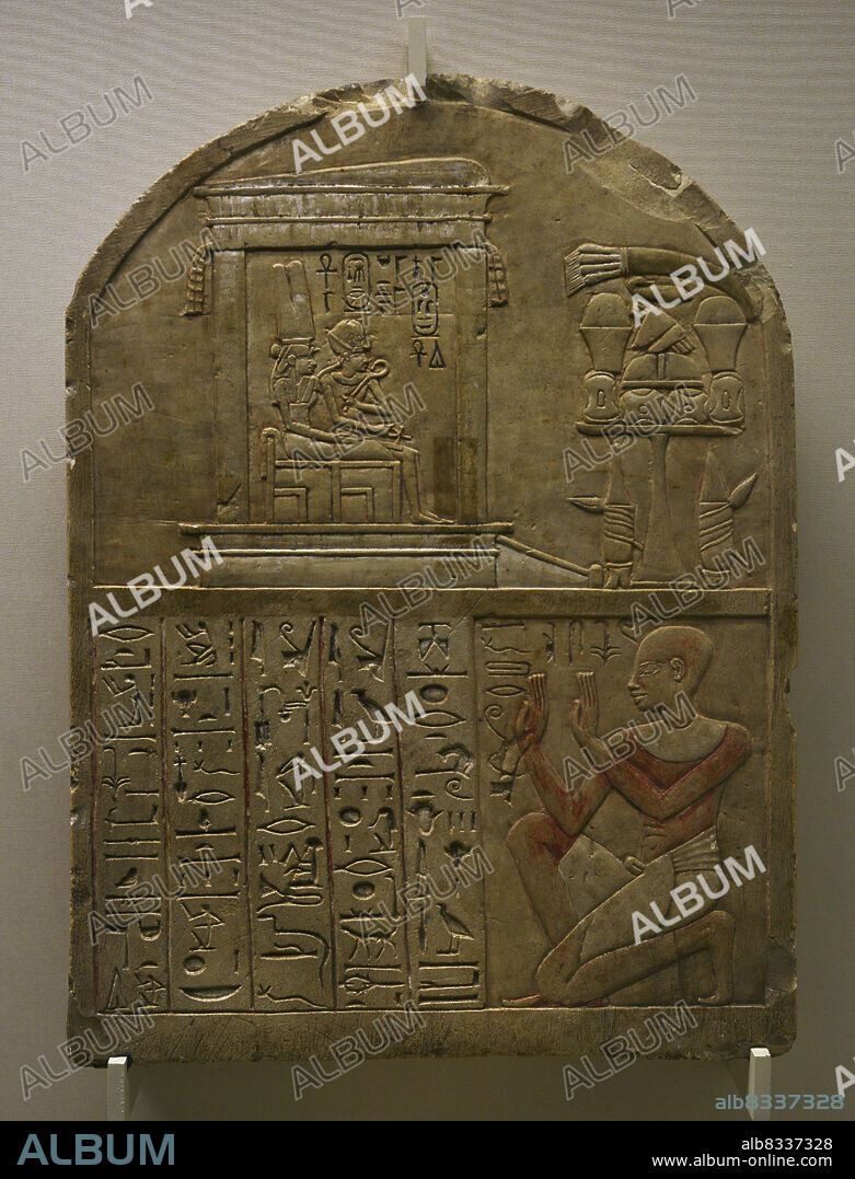 Egypt. Stele of the scribe Iry. New Kingdom. 18th Dynasty, ca. 1300 BC. The upper part depicts a sanctuary, in which King Ahmose (the founder of the 18th Dynasty) and Queen Ahmose-Nefertari are sitting on their thrones. The lower part shows the scribe Iry kneeling and saying a prayer that is inscribed in hieroglyphs in front of him. Polychrome limestone. Calouste Gulbenkian Museum. Lisbon, Portugal.