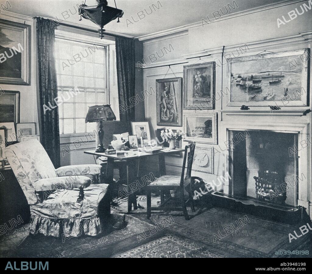 'Edward Marsh's living-room', c1934. The living room of Sir Edward Howard Marsh (1872-1953) at 5 Raymond Buildings Gray's Inn. Marsh was a British polymath, translator, arts patron and civil servant. As a civil servant he worked as Private Secretary to a serveral of Great Britain's most powerful ministers, including Winston Churchill. He was also an influential figure within Britain's homosexual community. From The Studio Volume 108. [The Offices of the Studio, London, 1934].