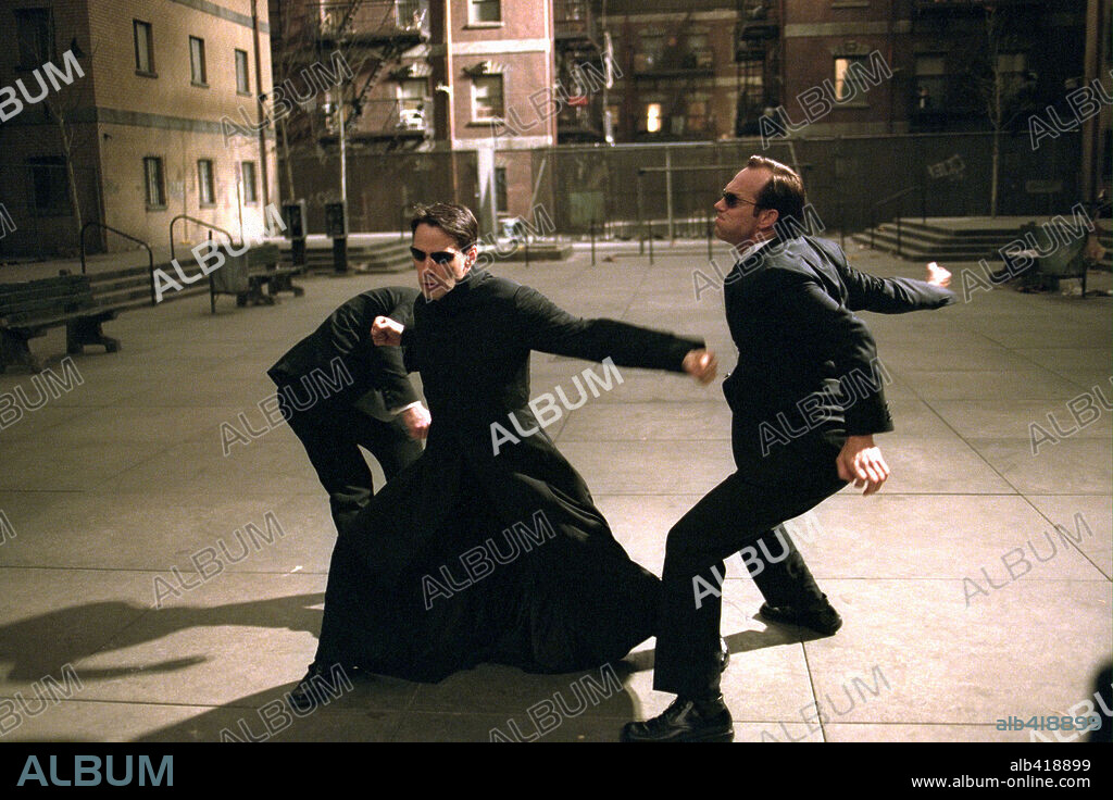 HUGO WEAVING and KEANU REEVES in THE MATRIX RELOADED, 2003, directed by ANDY WACHOWSKI and LARRY WACHOWSKI. Copyright WARNER BROS. PICTURES.