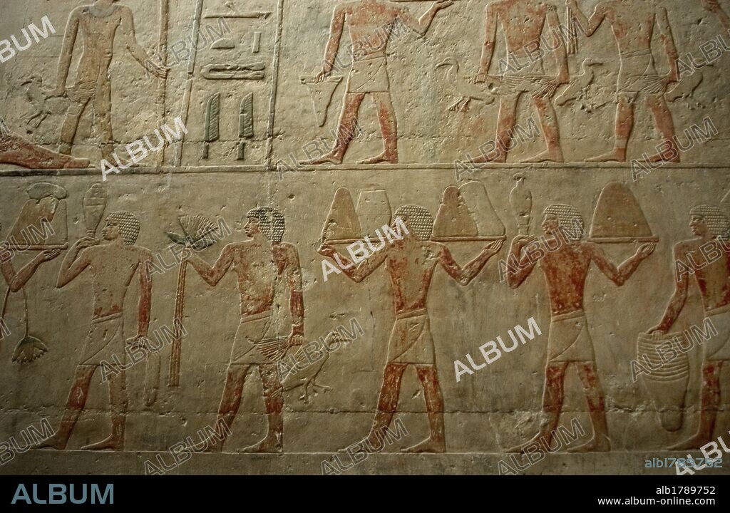 ARTE EGIPCIO. EGIPTO. Relieves policromados del interior de la MASTABA DE TI. Importante personaje de la corte de finales V DINASTIA. IMPERIO ANTIGUO. Escenas de siervos transportando ofrendas. NECROPOLIS DE SAKKARA.