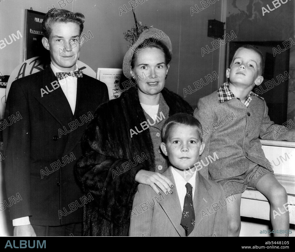 Frank Eppler (13), Mrs Gage, James Epler (8) Front, Joseph Gage the III aged 4. Wife and family of captain J.A. Gage, U.S.N. Naval attache for air U.S. Embassy in Australia. July 25, 1955.