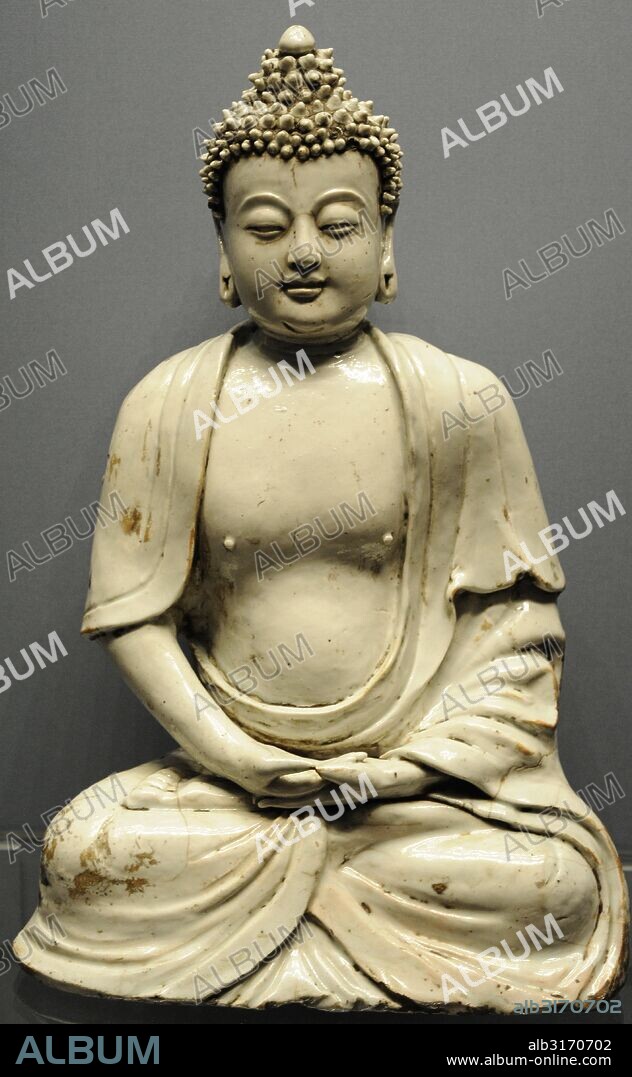 East Asian Buddhism. Pure Land Buddhism. Buddha amitabha. From China, Yuan Dynasty (1279-1368). Porcelain. The State Hermitage Museum. Saint Petersburg. Russia.