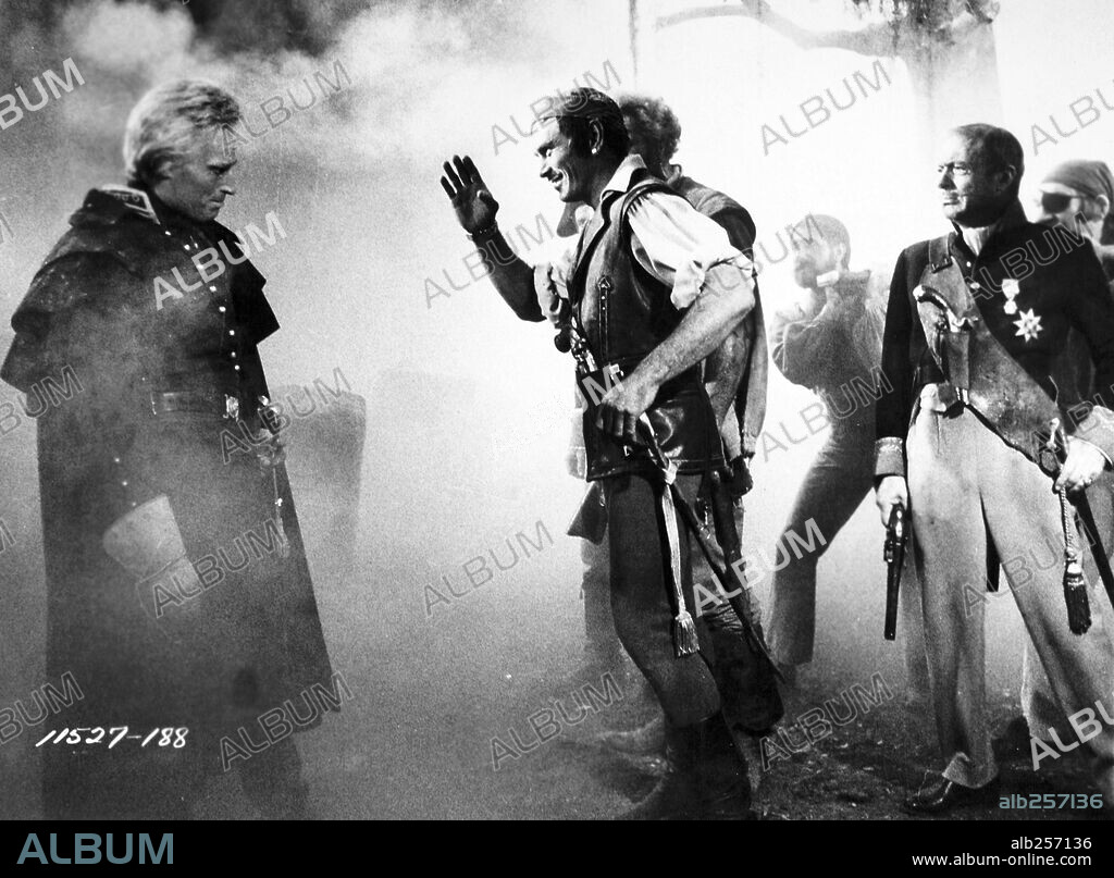 CHARLES BOYER, CHARLTON HESTON and YUL BRYNNER in THE BUCCANEER, 1958, directed by ANTHONY QUINN. Copyright PARAMOUNT PICTURES.