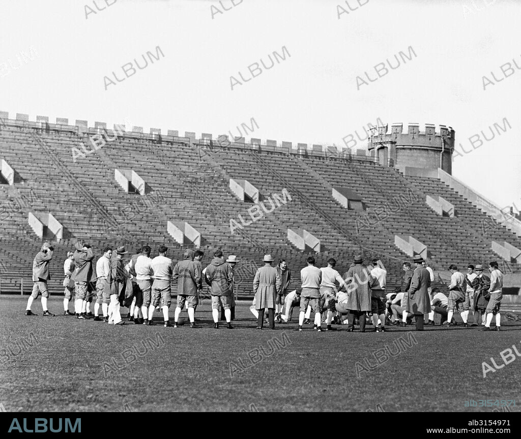 Chicago, Illinois:  November 15, 1929. The University of Southern California football attempting to hold a secret practice at Stagg Field at the University of Chicago. USC will play Notre Dame at Soldier Field in Chicago tomorrow where it is expected that 110,000 fans will see the game.