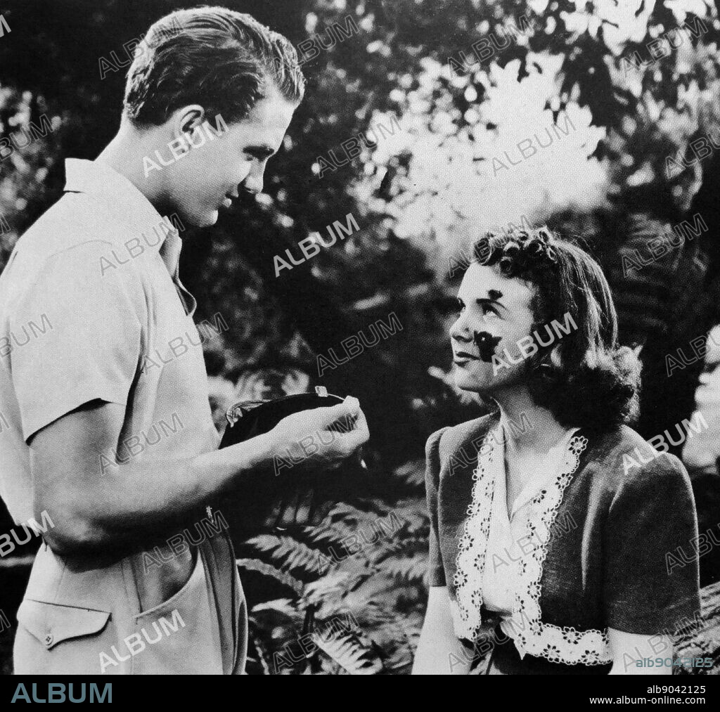 First Love is a 1939 American musical film directed by Henry Koster and starring Deanna Durbin. Based on the fairy tale Cinderella, the film is about an orphan who is sent to live with her wealthy aunt and uncle after graduating from boarding school.