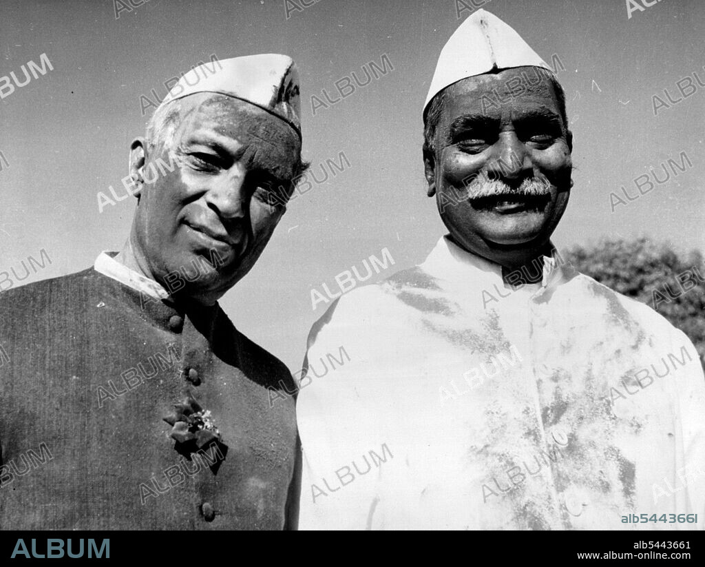 The best of Friends -- Indian President Rajendra Prasad (right) and Indian Premier Jawaharlal Nehru - The Best of Friends, really - were up early on March 9 to throw coloured powders and coloured waters at each other. It was all part of the festival of Holi - Marking the advent of summer - and all New Delhi was at it. The day closed with the traditional processions to the nearest river for community bathing. March 24, 1955. (Photo by Associated Press Photo).