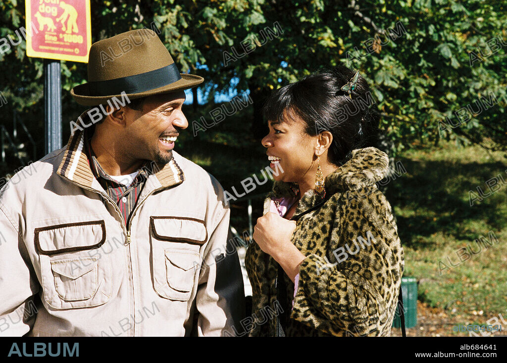 MIKE EPPS and REGINA HALL in THE HONEYMOONERS, 2005, directed by JOHN SCHULTZ. Copyright PARAMOUNT PICTURES / HESSION, JONATHAN.
