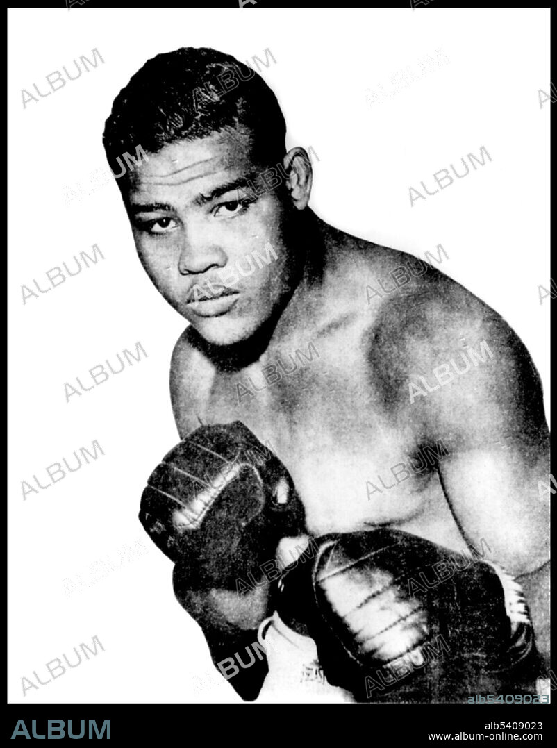 Joe Louis (May 13, 1914 - April 12, 1981) was an African-American professional boxer and the World Heavyweight Champion from 1937-49. He made 25 defenses of his Heavyweight title. In 2005, Louis was ranked as the #1 heavyweight of all-time by the International Boxing Research Organization, and was ranked #1 on The Ring's list of the 100 Greatest Punchers of All-Time. He is widely regarded as the first African-American to achieve the status of a nationwide hero.  No photographer credited, June 8, 1936.