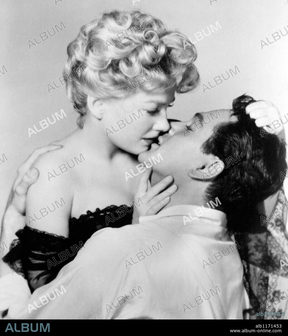 ANNE BAXTER and ROCK HUDSON in ONE DESIRE, 1955, directed by JERRY HOPPER. Copyright UNIVERSAL PICTURES.