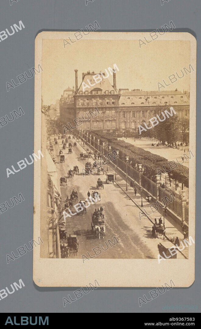 Street view of the Rue de Rivoli and the Jardin des Tuileries, Paris, Rue de Rivoli (title on object), Carte-de-visite, so-called instantanée, showing early street view of the Rue de Rivoli in Paris, with moving carriages and people walking., anonymous, Paris, c. 1865, cardboard, paper, albumen print, height 101 mm × width 64 mm.