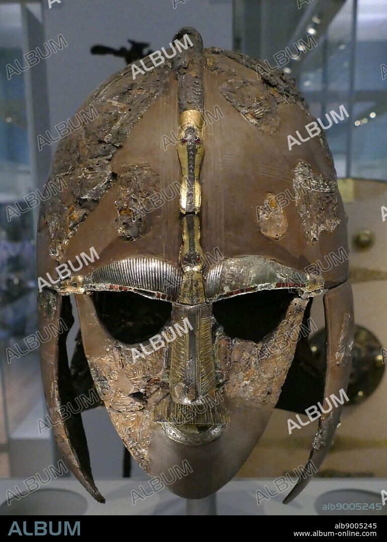 reconstruction of the Sutton Hoo helmet, a decorated Anglo-Saxon helmet discovered during the 1939 excavation of the Sutton Hoo ship-burial. Buried around 625 AD. it is believed to have been the helmet of King Raedwald; for whom its elaborate decoration may have given it a secondary function almost akin to a crown.
