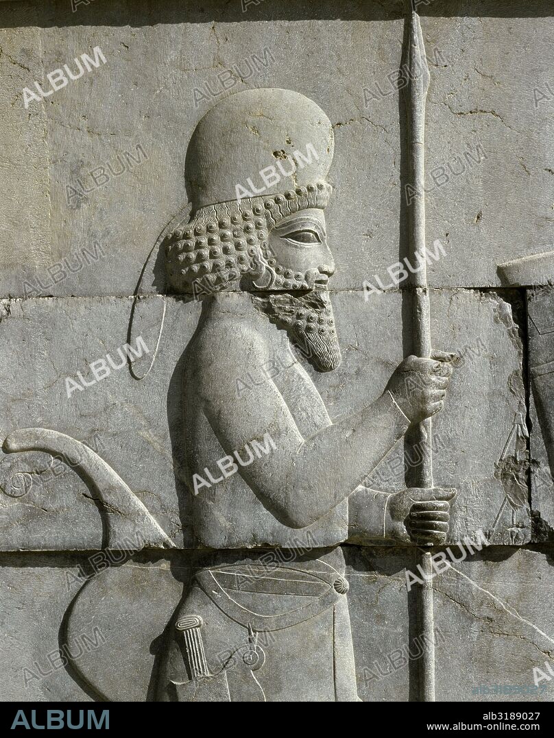 Achaemenid Empire. Persepolis. Relief of a Mede soldier (round cap), detail . The tripylon or Central Palace. 5th century BC. Iran (Persia).