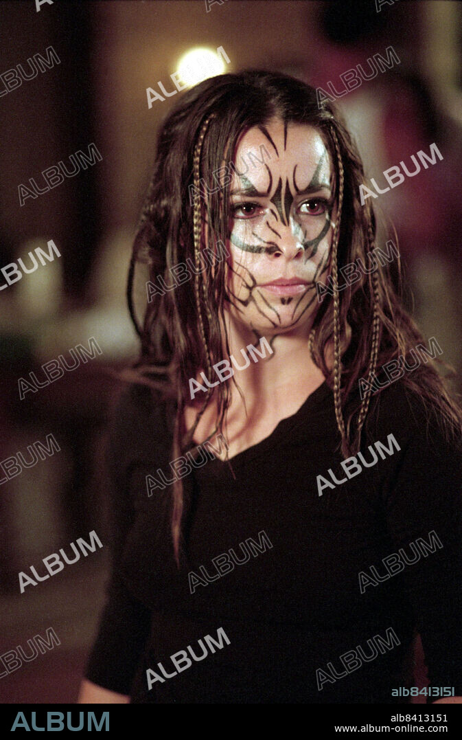 HOLLY MARIE COMBS in CHARMED, 1998. Copyright THE WB TELEVISION NETWORK.