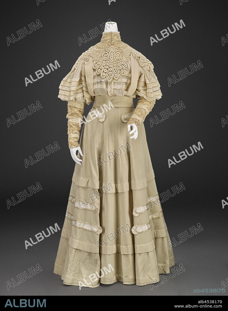 dress with jacket (blouse, jacket, skirt, belt), L. P. Hollander & Co., Boston, Design House (American), 1890s, wool, silk velvet, silk chiffon, lace, A) blouse: center back 21 in., center front 20 in., bust 38 in., waist 24 in., sleeve length 25 in., shoulders 14 in. B) jacket: center back 15-1/2 in., center front 16-1/2 in., bust 37 in., waist 27-1/2 in., sleeve length 18-1/2 in., shoulders 14 in. C) skirt: center back 48-1/4 in., center front 42 in., waist 25-1/2 in. D) belt: 29 x 2-1/2 in., A) bodice: Label, sewn: L. P. Hollander & Co, BOSTON NEW YORK NEWPORT Label, handwritten in ink, sewn, waistband: 5644 [couture number] B) jacket: Label, sewn: L. P. Hollander & Co, BOSTON • NEW YORK • NEWPORT D) belt: Stitched: 7564 [couture number], Textile and Fashion Arts.
