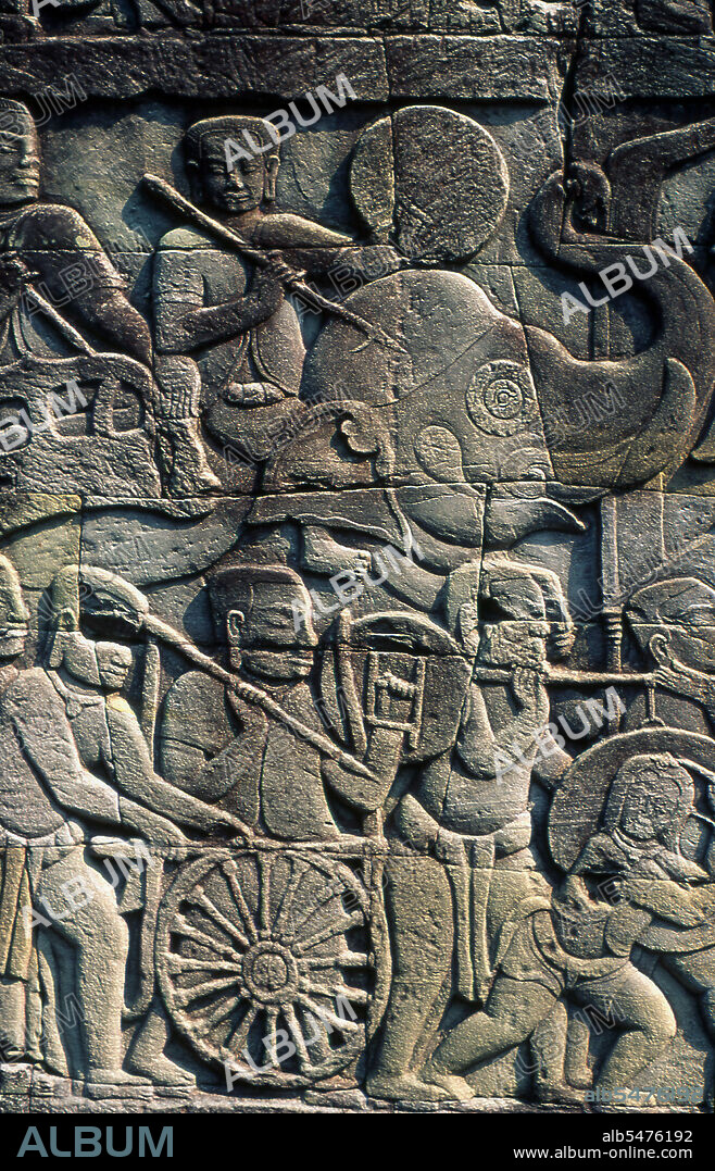 The Bayon was originally the official state temple of the Mahayana Buddhist King Jayavarman VII. The Bayon, at the centre of Angkor Thom (Great City), was established in the 12th century by King Jayavarman VII. Angkor Thom, meaning 'The Great City', is located one mile north of Angkor Wat. It was built in the late 12th century CE by King Jayavarman VII, and covers an area of 9 km, within which are located several monuments from earlier eras as well as those established by Jayavarman and his successors. It is believed to have sustained a population of 80,000-150,000 people. At the centre of the city is Jayavarman's state temple, the Bayon, with the other major sites clustered around the Victory Square immediately to the north. Angkor Thom was established as the capital of Jayavarman VII's empire, and was the centre of his massive building programme. One inscription found in the city refers to Jayavarman as the groom and the city as his bride. Angkor Thom seems not to be the first Khmer capital on the site, however, as Yasodharapura, dating from three centuries earlier, was centred slightly further northwest. The last temple known to have been constructed in Angkor Thom was Mangalartha, which was dedicated in 1295. In the following centuries Angkor Thom remained the capital of a kingdom in decline until it was abandoned some time prior to 1609.