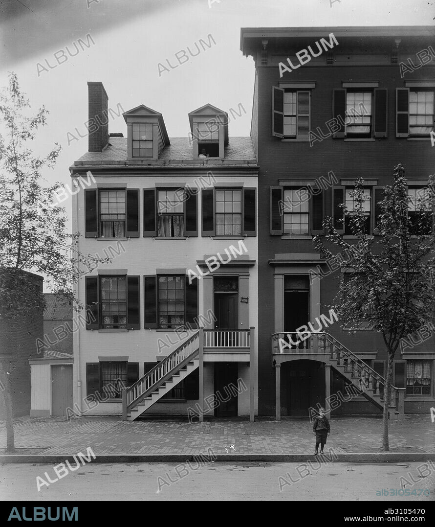 Photograph of the exterior of Mary Elizabeth Jenkins Surratt's Boarding House. Mary Elizabeth Jenkins Surratt (1820-1865) an American boarding house owner who was convicted for her role in the conspiracy to assassinate President Abraham Lincoln. Dated 1890.