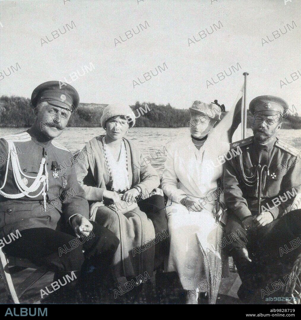 Aide-de-camp Captain Nikolai Sablin, Grand Duchess Olga Nikolaevna of Russia, Empress Alexandra Feodorovna and Emperor Nicholas II of Russia boating on the Dnieper River near Mogilev. ca. Summer 1916.