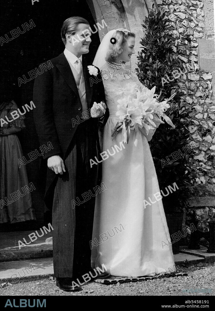 Mr. John Julius Cooper, son of viscount Norwich of Aldwich (formerly sir Duff Cooper) and Miss Anne Clifford, daughter of Sir Bebe and lady Clifford, were today married at St. Edwards Church Sutton park, Surrey. Bride & groom. November 13, 1952. (Photo by Daily Mail Contract Picture).