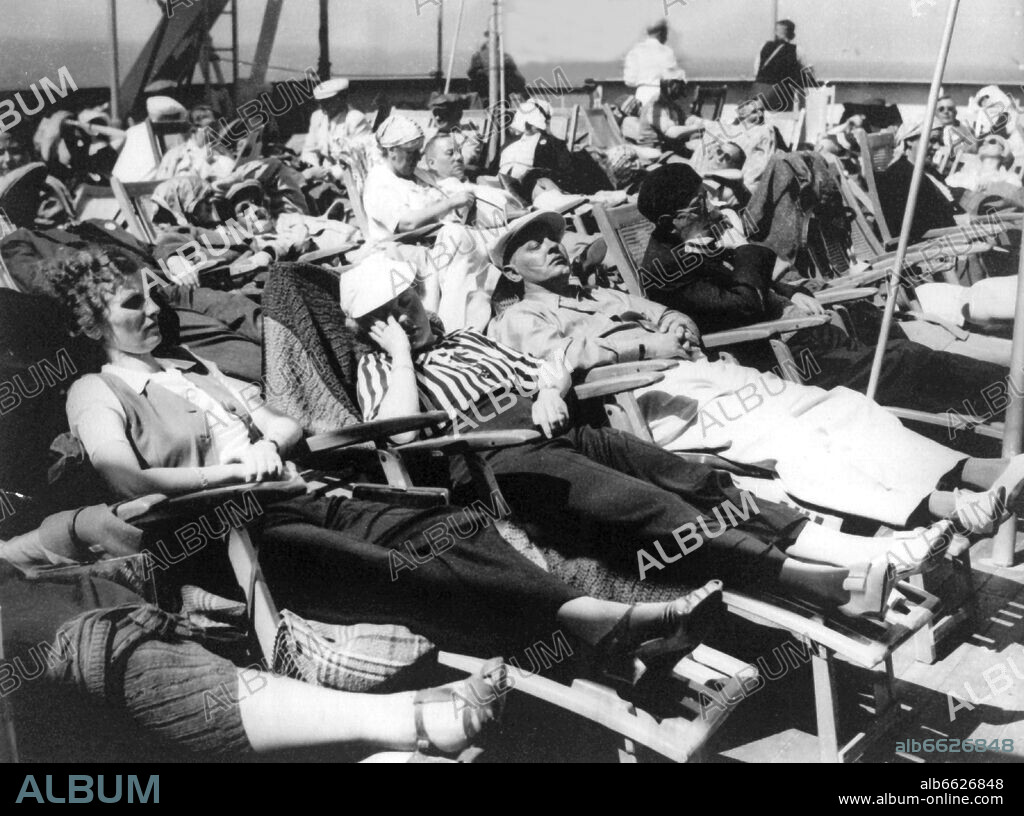"Strength Through Joy" holidaymakers relax on beach chairs on deck of the "Strength Through Joy" ship "Robert Ley" in May 1939. The Nazi regime took over control in the fields of spare time and holidays by founding the National Socialist organisation "Strength Through Joy" in November 1933. Free time events in the fields of culture, entertainment, sports and customs were offered. Due to affordable prices, "Strength Through joy" became very popular. 30/04/1939
