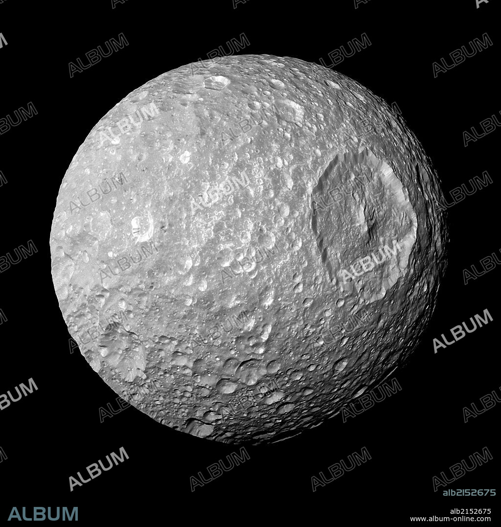 Saturn's moon Mimas. The large Herschel Crater dominates Mimas. Cassini. (Photo by: Universal History Archive/UIG via Getty Images).