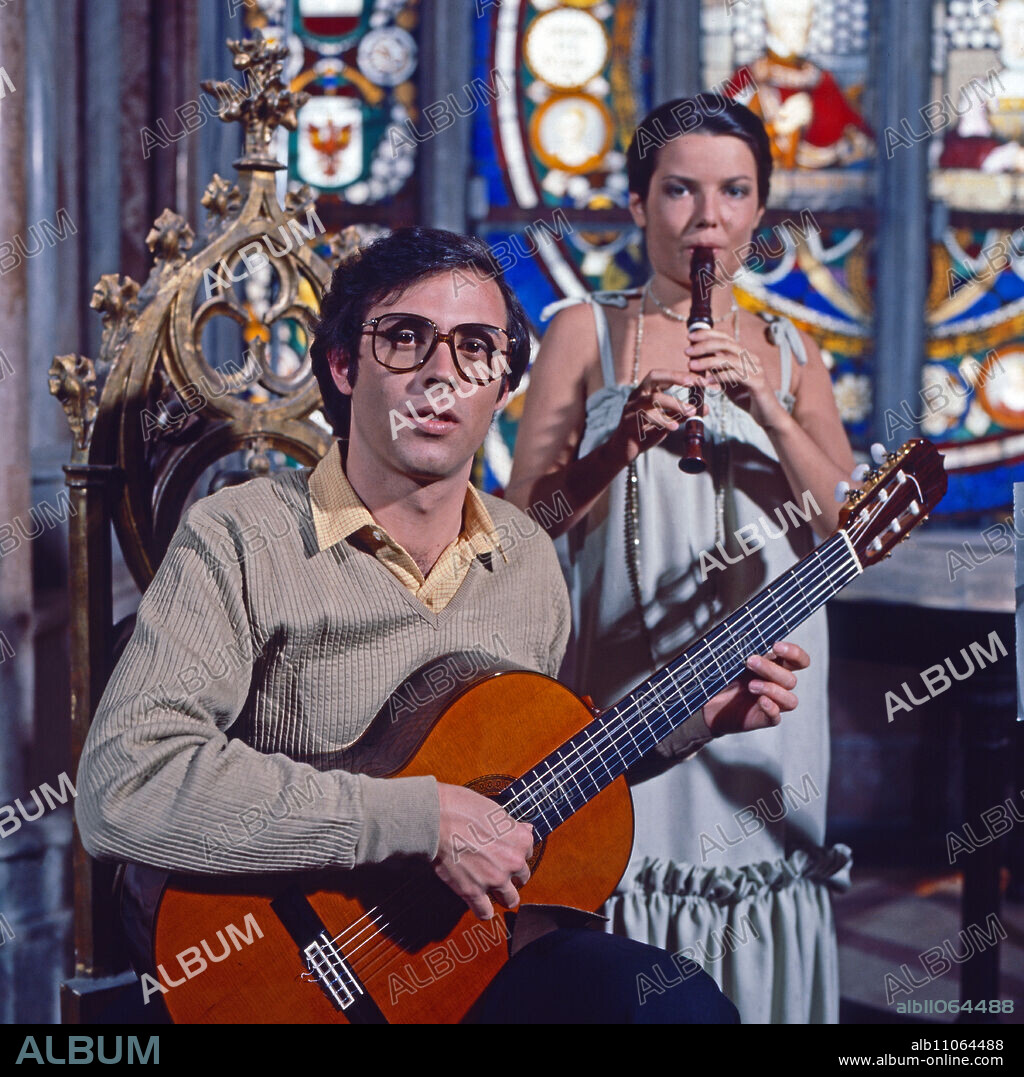 Martin Remmert, German classical guitarist, accompanied by Pia Palme playing the recorder, Germany ca. 1981.