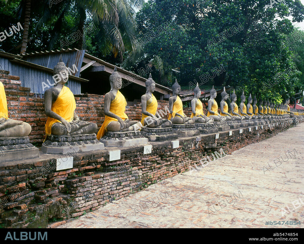 Wat Yai Chai Mongkhon (Wat Chai Yai Mongkol) dates from the reign of King U Thong (Uthong) and was built around 1357. U Thong or Ramathibodi I (1314–1369) was the first king of the kingdom Ayutthaya, reigning from 1351 to 1369. He was known as Prince U Thong before he ascended to the throne on March 4, 1351. A native of Chiang Saen (now in Chiang Rai Province) he claimed descent from Khun Borom and propagated Theravada Buddhism as the state religion. Ayutthaya (Ayudhya)) was a Siamese kingdom that existed from 1351 to 1767. Ayutthaya was friendly towards foreign traders, including the Chinese, Vietnamese (Annamese), Indians, Japanese and Persians, and later the Portuguese, Spanish, Dutch and French, permitting them to set up villages outside the city walls. In the sixteenth century, it was described by foreign traders as one of the biggest and wealthiest cities in the East. The court of King Narai (1656–1688) had strong links with that of King Louis XIV of France, whose ambassadors compared the city in size and wealth to Paris.