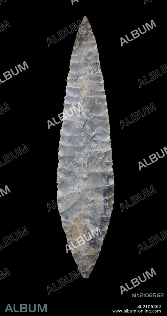 Piece from the exhibition "Art without artists". Large flint laurel-leaf point from Placard Cave, Vilhonneur, Carante (France). Solutrean period.