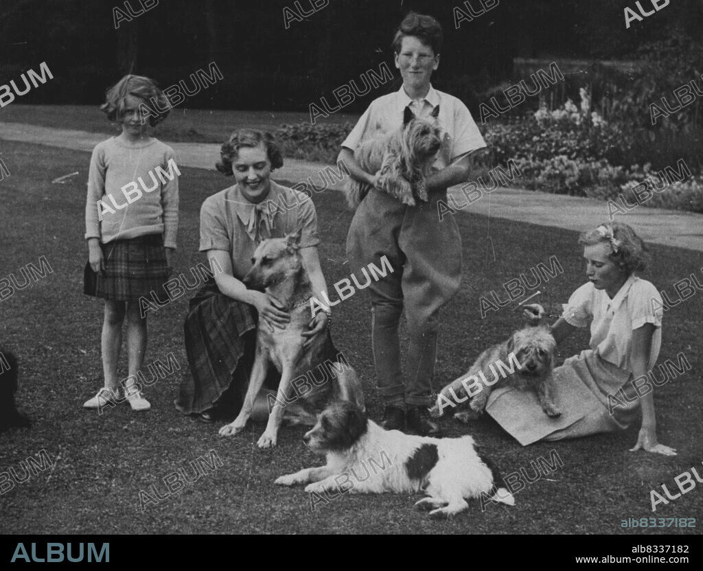 Photo Shows:- The Earl of Dalkeith in 1935. Left to right are:- Lady Caroline Scott; The Duchess of Buccleuch; the Earl of Dalkeith; Lady Elizabeth Scott (Now Duchess of Northumberland). Under no Circumstance may this photograph be published except after an official announcement of the Betrothal of Princess Margaret to the Earl of Dalkeith. January 01, 1952. (Photo by Paul Popper).