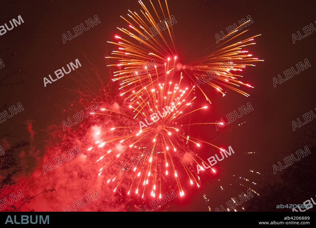 Fireworks celebrating Guy Fawkes night, Ravenscourt Park, London, W6, England.