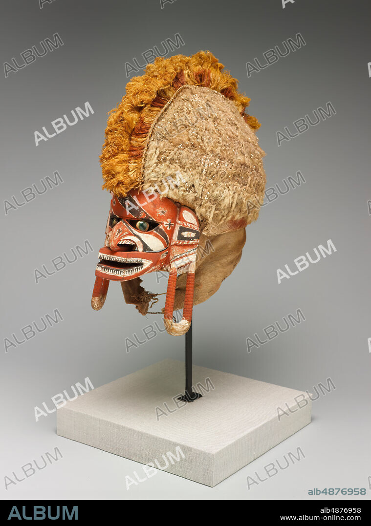 Unknown Artist, Malagan Mask, ca. 1870 - 1890, polychrome, wood, natural fiber, 16 1/8 in. x 12 1/2 in. x 8 5/8 in. (41 cm. x 31.8 cm. x 21.9 cm.), The Malagan ceremony takes place among the tribes of New Ireland, an island off the coast of Papua New Guinea. The ritual is meant to complete the cycle of mourning for those who have died, sending off their spirits that are represented through masks like these, as well as through painted panels and other sculptures. They were used during the elaborate ceremonies, which sometimes last days and include trade, feasting, music, song, and dance. Once the ritual is completed the masks lose their power and meaning, and are no longer needed. Traditionally they were burned, but with the increased presence of Europeans in the late nineteenth century, Melanesians realized they could sell the sculptures to the visiting westerners hungry for 'exotic' ritual objects from cultures around the world.
