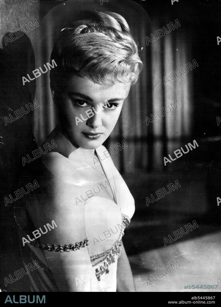 Is this the Face that Launched a Thousand Ships.... -- A Study of Actress Rossana Podesta as the Immortal Helen of Troy. We can well believe it, looking at the Lovely Features of Rossana Podesta, Italian star who is taking the part of his Tory's most beautiful Vamp, Helen of troy, in the ***** of that title mow being made in Rome. Her fated love affair with Paris and the Dramatic siege of troy by the Enraged Husband, Menelaus, form the Subjects of this Colossal Production which is Employing 27 stars and 5000 Extras at the Cinecitta Studios. There is no Record of the cost of the real siege of troy, but it is Believed that the film of the event is costing ***** Brothers £2,000,000. Recently the sets at Rome's Studio City where the filming has been going on have been swept by a Disaster fire. September 1, 1954. (Photo by Paul Popper Ltd.).