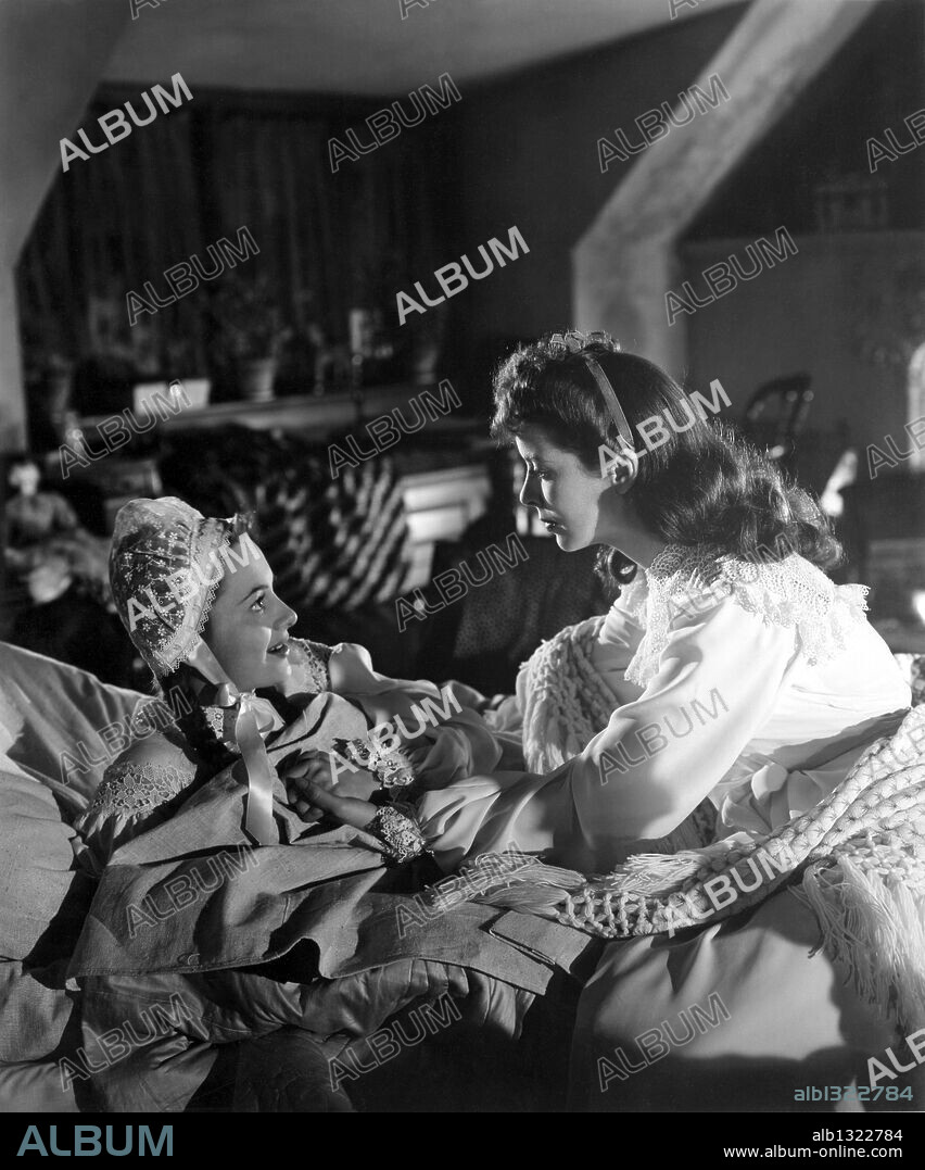 IDA LUPINO and OLIVIA DE HAVILLAND in DEVOTION, 1946, directed by CURTIS BERNHARDT. Copyright WARNER BROTHERS.