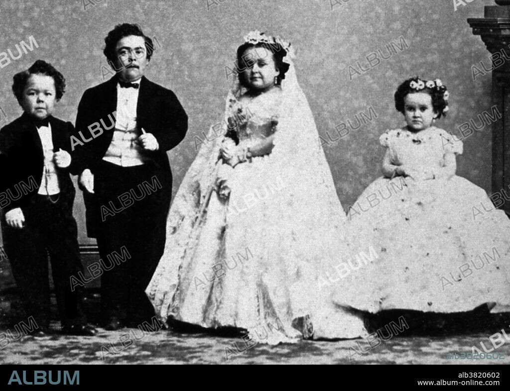 Charles Sherwood Stratton (January 4, 1838 - July 15, 1883), "General Tom Thumb", was an American dwarf performer. P.T. Barnum, a distant relative (half fifth cousin, twice removed), heard about Stratton and after contacting his parents, taught the boy how to sing, dance, mime, and impersonate famous people. Barnum took young Stratton on a tour of Europe, making him an international celebrity. His marriage with a little person, Lavinia Warren (October 31, 1842 - November 25, 1919), became front-page news. The wedding took place at Grace Episcopal Church and the wedding reception was held at the Metropolitan Hotel. The best man at the wedding was Commodore Nutt, another dwarf performer in Barnum's employ. Following the wedding, the couple was received by President Lincoln at the White House. Under Barnum's management, Stratton became a wealthy man. He owned houses, a steam yacht, and he had a wardrobe of fine clothes. When Barnum got into financial difficulty, Stratton bailed him out. Later, they became business partners. Stratton died unexpectedly of a stroke in 1883, at the age of 45. Over 20,000 people attended the funeral. Warren died in 1919 at the age of 77 and is buried next to her first husband with a simple gravestone that reads: "His Wife.".