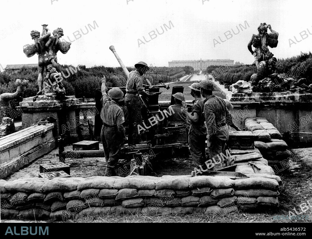 Fifth Cross the Volturno: A fifth Army Bofors gun in the grounds of King Victor Emanuel's palace at Caserta (on the railway just south of the River Volturno). During the hours of darkness of Oct. 14/15 1943, the Fifth Army launched its big attack on the Volturno River. Soon several bridgeheads were in Allied hands and armour began to make the river crossing. Now (19.10.43) Allied forces are well over the river at several points and have occupied the town of Cancello, about 6 miles from the coast.