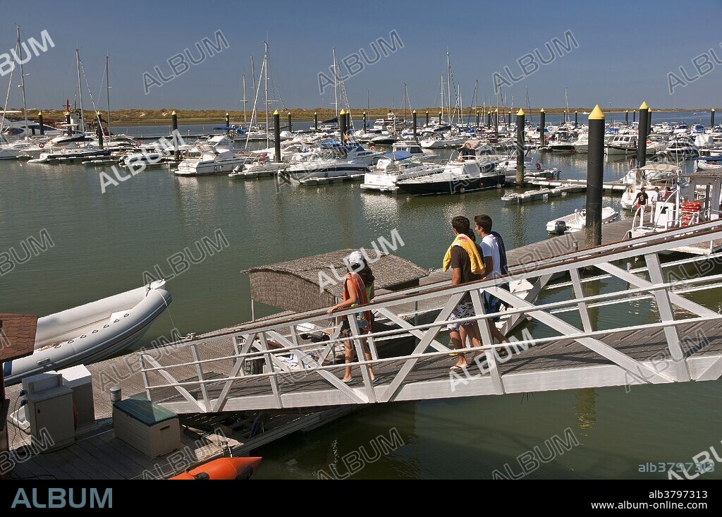 Marina and tourists, El Rompido, Cartaya, Huelva province, Region of Andalusia, Spain, Europe.