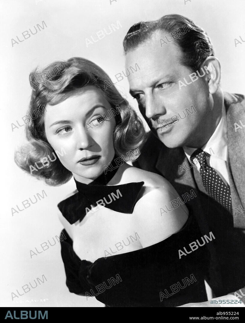 GLORIA GRAHAME and MELVYN DOUGLAS in A WOMAN'S SECRET, 1949, directed by NICHOLAS RAY. Copyright RKO RADIO.