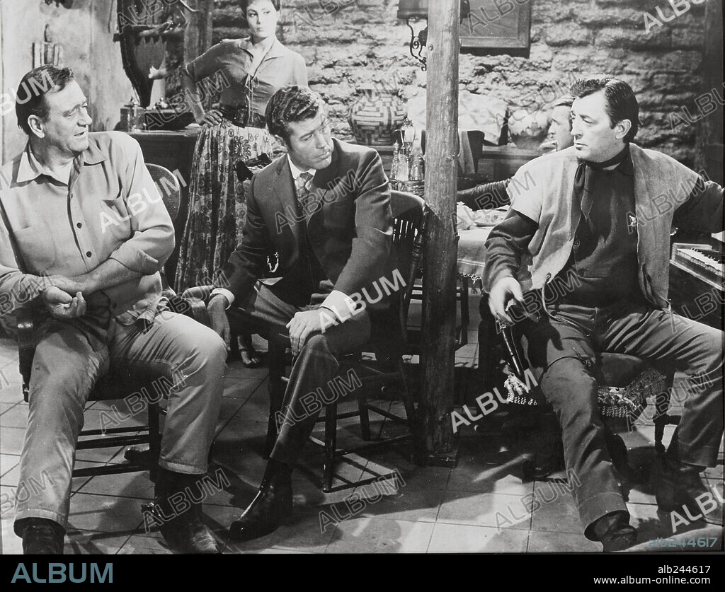 JOHN WAYNE et ROBERT MITCHUM dans EL DORADO, 1966, réalisé par HOWARD HAWKS. Copyright PARAMOUNT PICTURES.