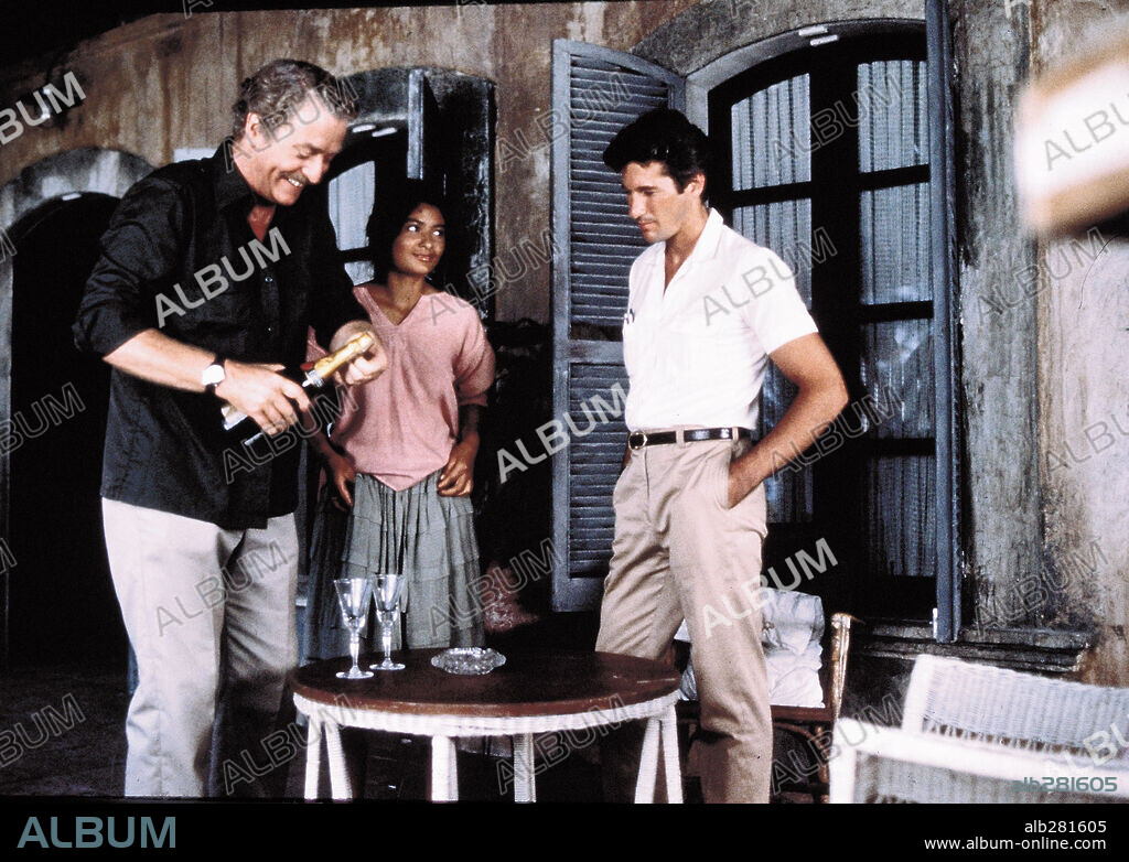 MICHAEL CAINE y RICHARD GERE en CÓNSUL HONORARIO, 1983 (THE HONORARY CONSUL), dirigida por JOHN MACKENZIE. Copyright PARAMOUNT PICTURES.