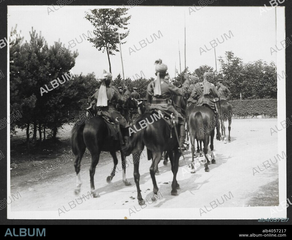 H. D GIRDWOOD. An Indian Cavalry escort to the C. in C. [Blendecques, France]. Rear view of mounted escort of lancers. 18 August 1915. Record of the Indian Army in Europe during the First World War. 20th century, 18 August 1915. Gelatin silver prints. Source: Photo 24/(310).