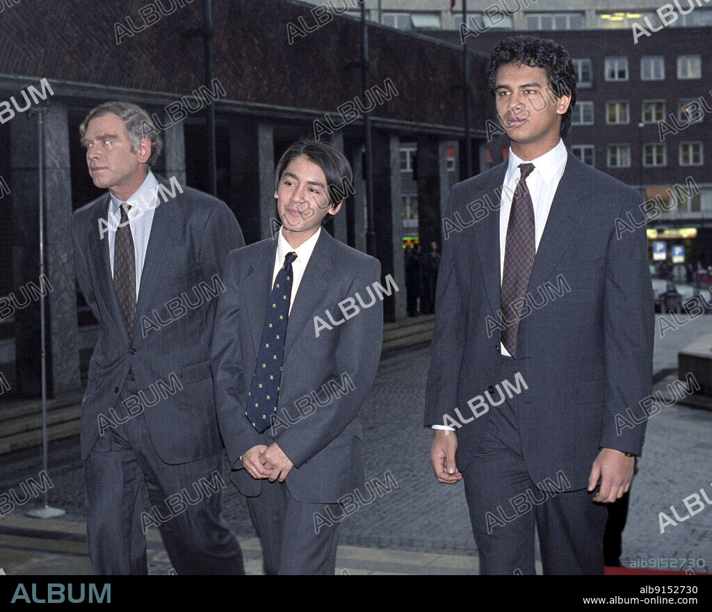 Oslo 1991-12-10. Nobel Peace Prize 1991 to Aung San Suu Kyi, opposition politician in Burma. Aung San Suu Kyi has been in house arrest since 1989, after she led the opposition to a superior election victory, who has never been respected by the military. The award was received by the Peace Prize winner's family, husband Michael Aris and sons Kim and Alexander Aris. Image: Aung's family; Husband Michael Aris and sons Kim (middle) and Alexander Aris arrive at the Nobel Prize Awards. Photo: Bjørn Sigurdsøn/NTB.