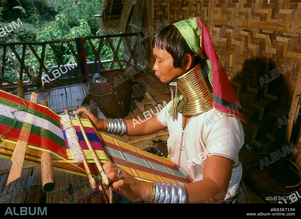 Thailand: Padaung (Long Neck Karen) woman weaving, Chiang